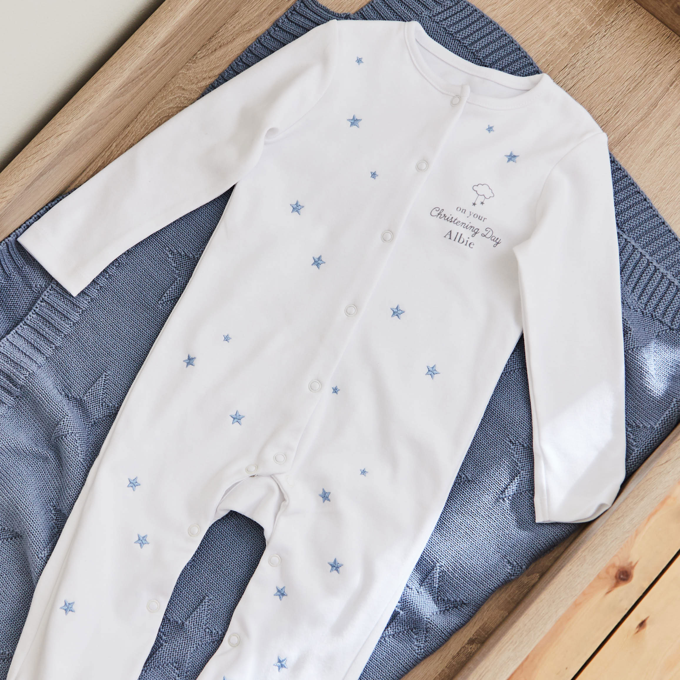 Personalised On Your Christening Day Blue Star Jersey Sleepsuit