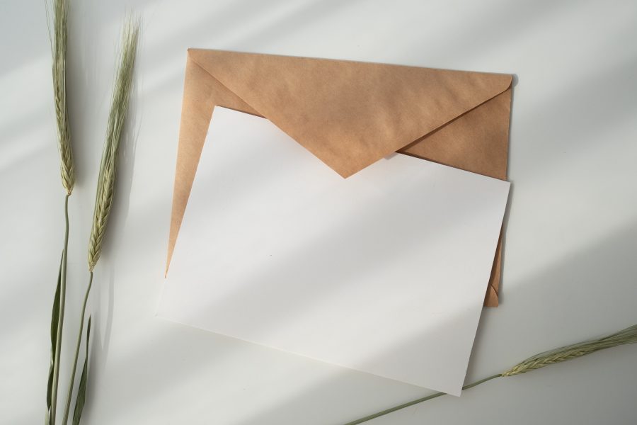 White card with brown envelope